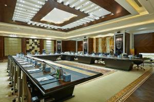 a large conference room with tables and chairs in it at Al Masa Hotel Nasr City in Cairo