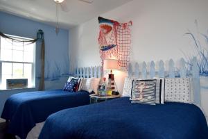 Кровать или кровати в номере Inn on the Avenue