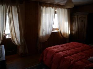 Postel nebo postele na pokoji v ubytování VillaBlanche