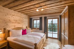 Postel nebo postele na pokoji v ubytování Prenner Alm