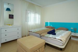 Postel nebo postele na pokoji v ubytování Piso Paraiso La Nea