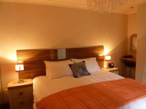 Cama o camas de una habitación en Hewlett Apartments