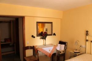Postel nebo postele na pokoji v ubytování Guesthouse Kleopatra's