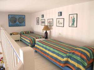 A bed or beds in a room at Isola d'Elba Come in Barca, a un Tuffo dal Mare