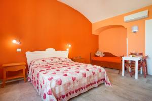 Posteľ alebo postele v izbe v ubytovaní Villa Mami Luroviga