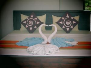 Postel nebo postele na pokoji v ubytování Hotel Kiyara