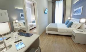 Posteľ alebo postele v izbe v ubytovaní Nuovo Albergo Centro