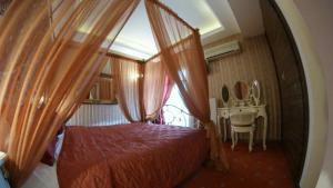 Rúm í herbergi á Hotel Mirto