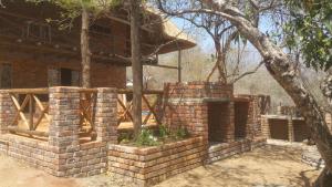 a house under construction with brick walls at Marlothii Safari House in Marloth Park +18 photos