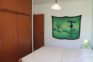 Postel nebo postele na pokoji v ubytování Residence Jonico
