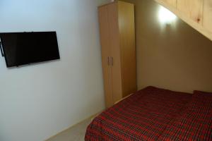 Postel nebo postele na pokoji v ubytování Apartments Radović