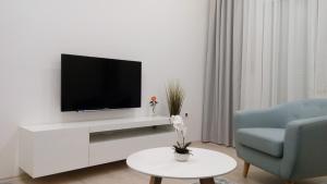 TV a/nebo společenská místnost v ubytování Apartment Sunce