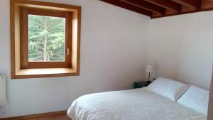 Postel nebo postele na pokoji v ubytování Finca el Roque