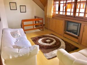 TV a/nebo společenská místnost v ubytování Duplex Borges De Medeiros