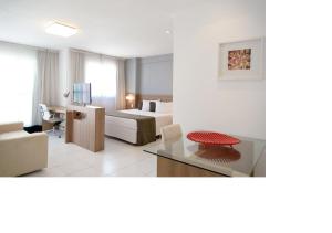 Een zitgedeelte bij Flat Verano Stay Barra da Tijuca