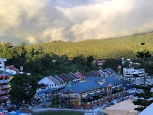 an aerial view of a town with a mountain at ATS Cameron Hotel & Apartments in Cameron Highlands