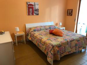 Postel nebo postele na pokoji v ubytování Residence Mare Verde + 35 fotografií
