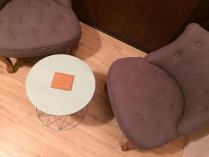 Posezení v ubytování Le Petit Beurre - Studio en Hypercentre de Beaune