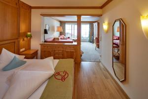 Postel nebo postele na pokoji v ubytování Hotel Lumberger Hof