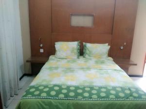 Кровать или кровати в номере De Hill Villa