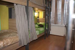 Säng eller sängar i ett rum på Hostel Balkonsky