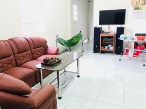 TV a/nebo společenská místnost v ubytování Bao Loc Homestay