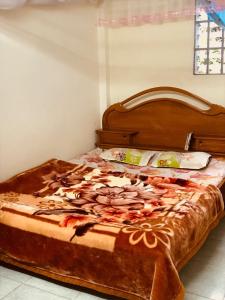 Postel nebo postele na pokoji v ubytování Bao Loc Homestay