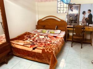 Postel nebo postele na pokoji v ubytování Bao Loc Homestay