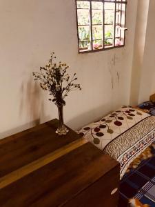 Postel nebo postele na pokoji v ubytování Bao Loc Homestay