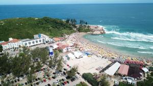 an aerial view of a beach with a crowd of people at Cris Hotel in Florianópolis