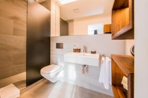 Baðherbergi á Boutique Hotel NI-MO