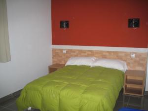 Postel nebo postele na pokoji v ubytování Hostal Ducal II