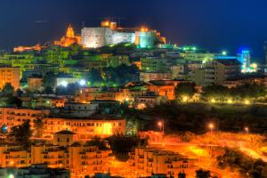 a cityscape of a city at night at Residence Chiesiola in Vieste