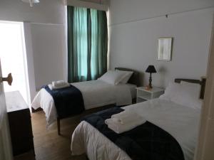 Postel nebo postele na pokoji v ubytování Roode Bloem Farm House