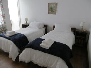 Postel nebo postele na pokoji v ubytování Roode Bloem Farm House