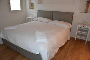 Postel nebo postele na pokoji v ubytování Suite In Centro Storico
