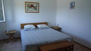 Postel nebo postele na pokoji v ubytování Villa Kos