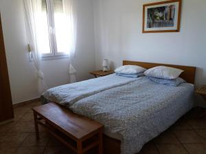 Postel nebo postele na pokoji v ubytování Villa Kos