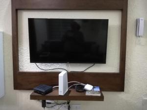 TV a/nebo společenská místnost v ubytování The Bellagio Getaway
