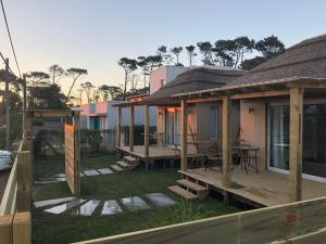 a row of modular homes with a deck at Los Quinchos in José Ignacio