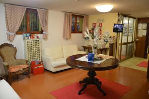 Posezení v ubytování Hotel Arcella