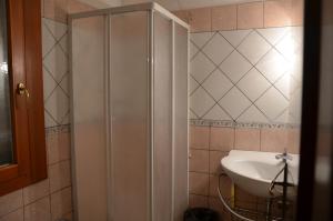 Koupelna v ubytování Hotel Arcella
