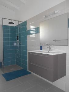Koupelna v ubytování Le Domaine Turquoise