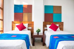 Letto o letti in una camera di C 1 Colombo Fort