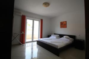 Postel nebo postele na pokoji v ubytování Apartment Dalmatien Traumhaus + 37 fotografií