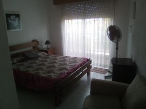 Ένα ή περισσότερα κρεβάτια σε δωμάτιο στο Buquitos
