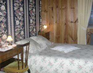 Cama o camas de una habitación en Chambres d'Hôtes La Jacquerolle