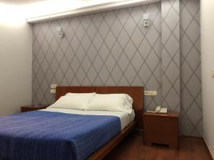Postel nebo postele na pokoji v ubytování Motel Abalo