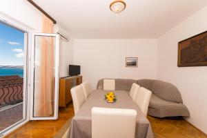 Ein Sitzbereich in der Unterkunft Apartmani Gaube