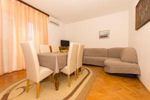 Ein Sitzbereich in der Unterkunft Apartmani Gaube